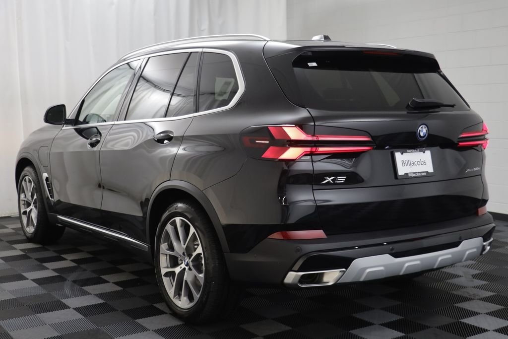New 2026 Black Sapphire Metallic BMW xDrive50e image 16