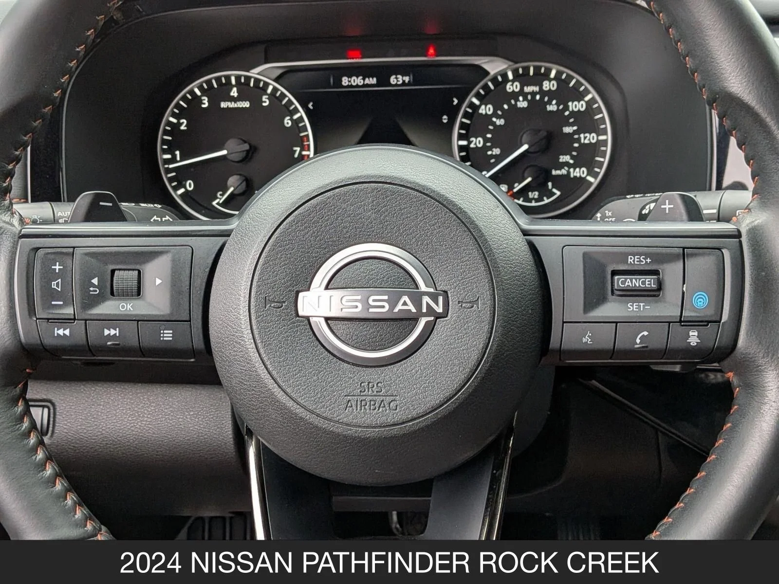 Used 2024 Obsidian Green Pearl/Super Black Nissan Rock Creek image 12