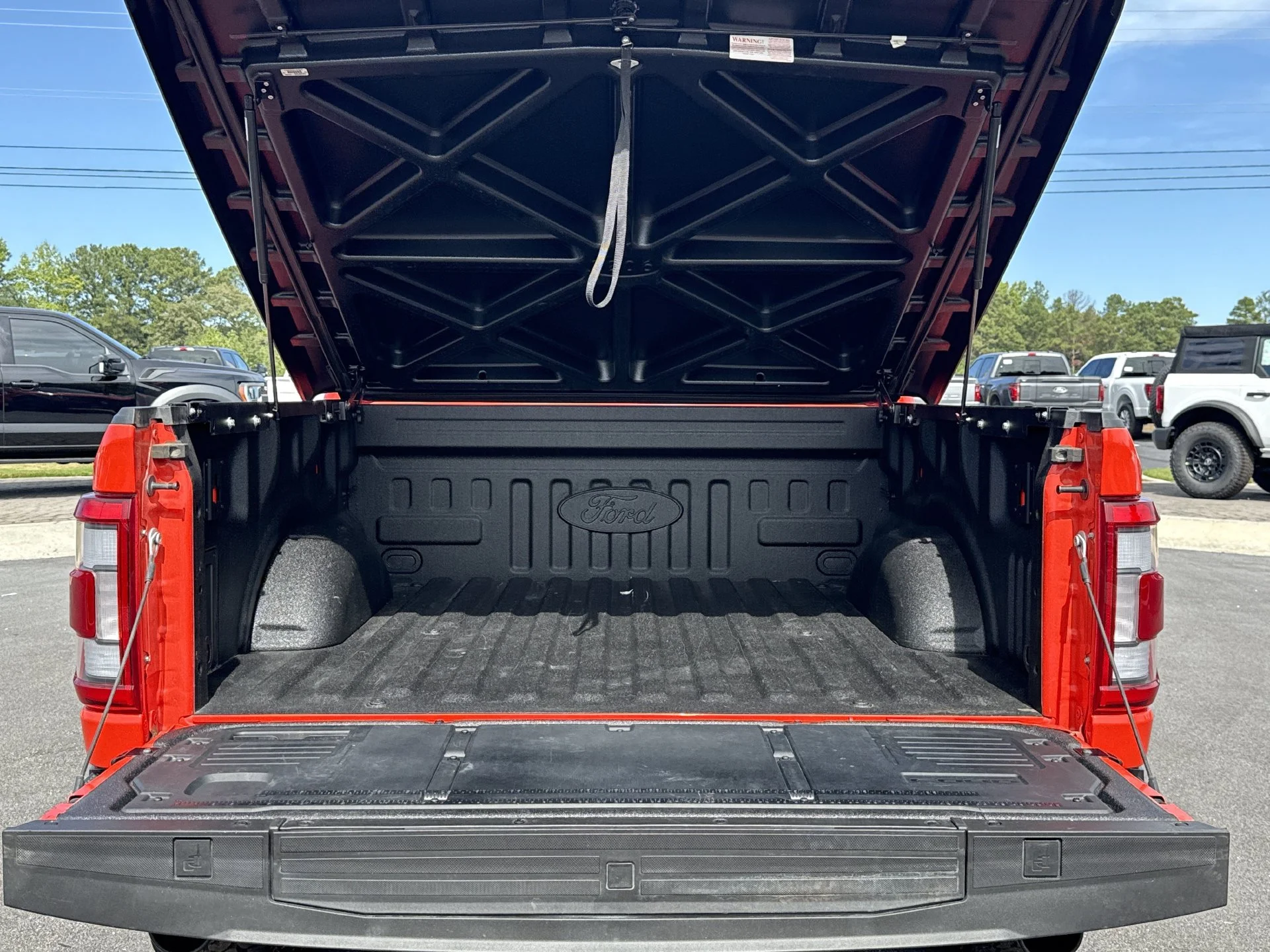 Certified Used 2023 Orange Metallic Ford Raptor image 23