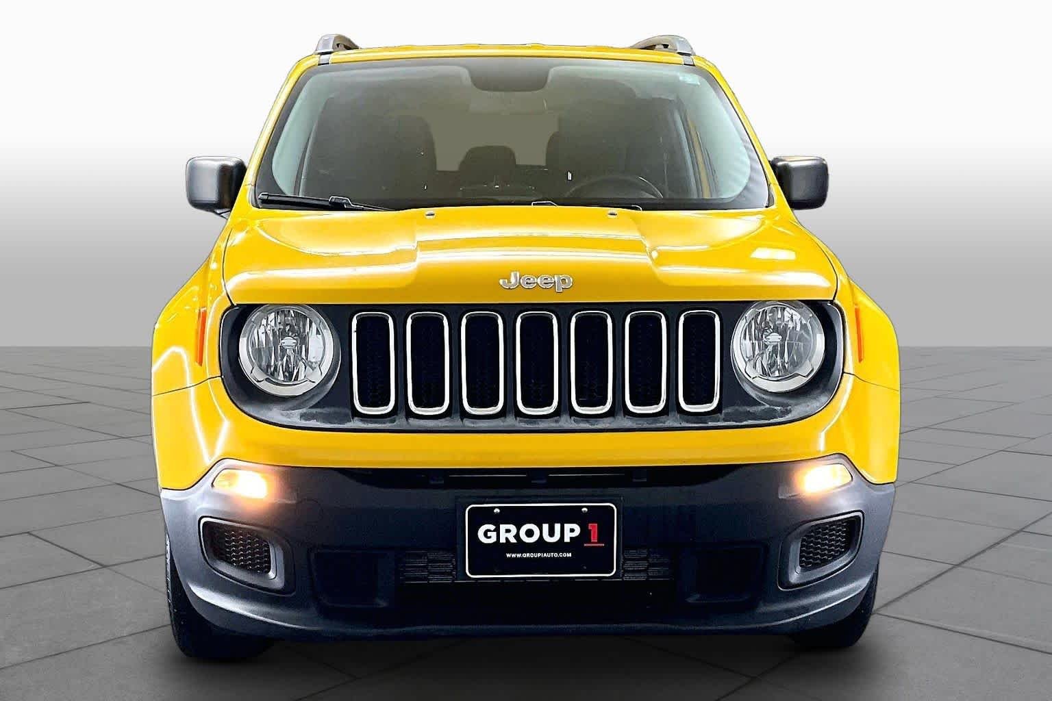Used 2017 Solar Yellow Jeep Sport image 4
