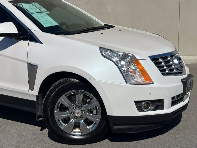 Used 2015 Cadillac SRX Luxury Collection with VIN 3GYFNBE33FS587770 for sale in Cathedral City, CA