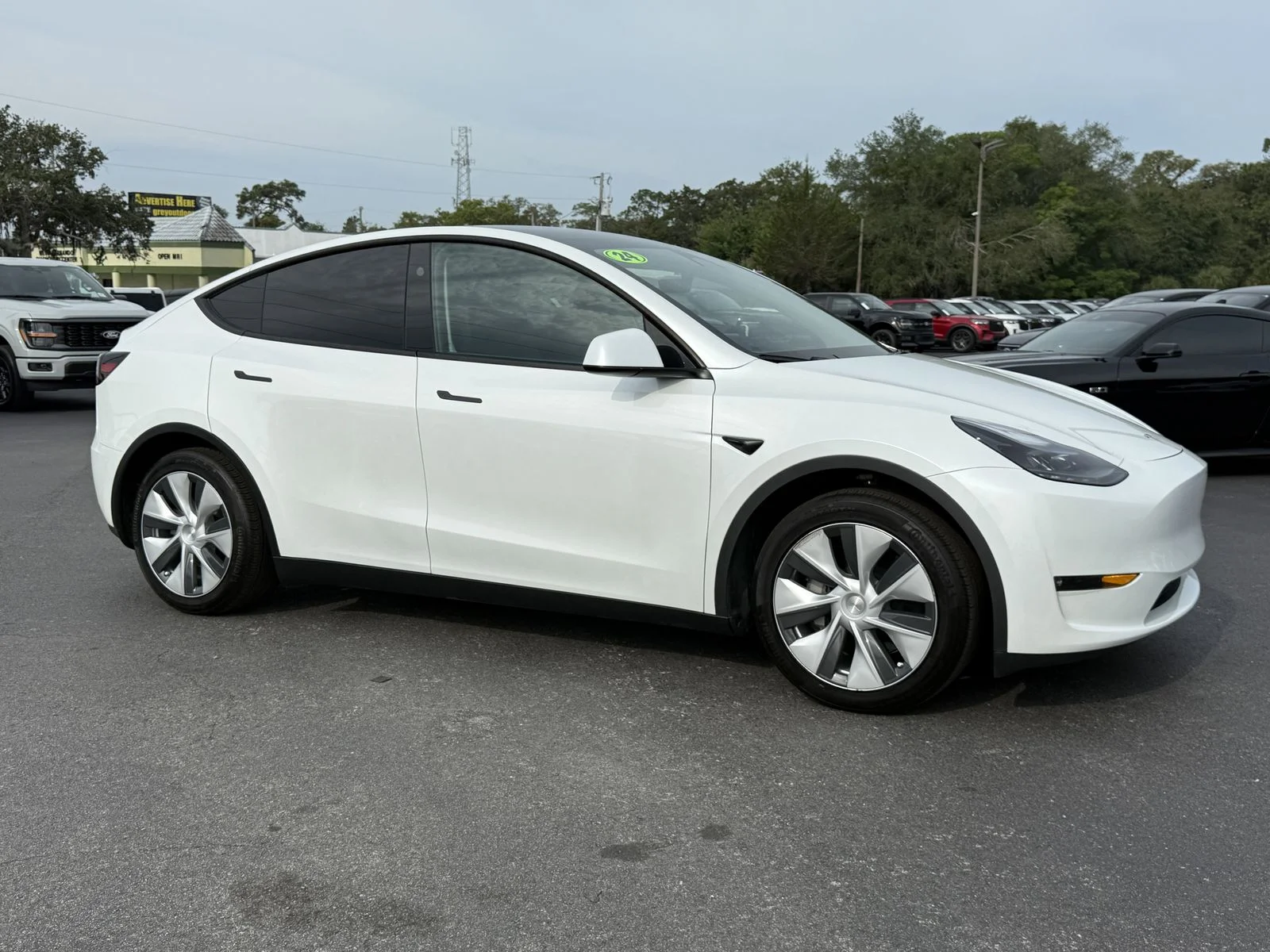 Used 2024 Tesla Model Y Long Range with VIN 7SAYGAEE3RF037893 for sale in Spring Hill, FL