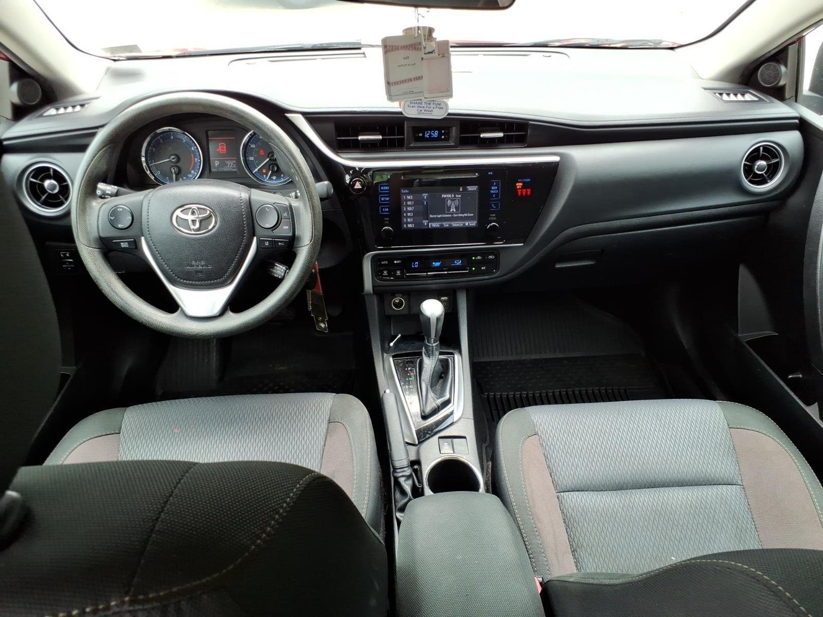 Used 2018 Barcelona Red Metallic Toyota LE image 23