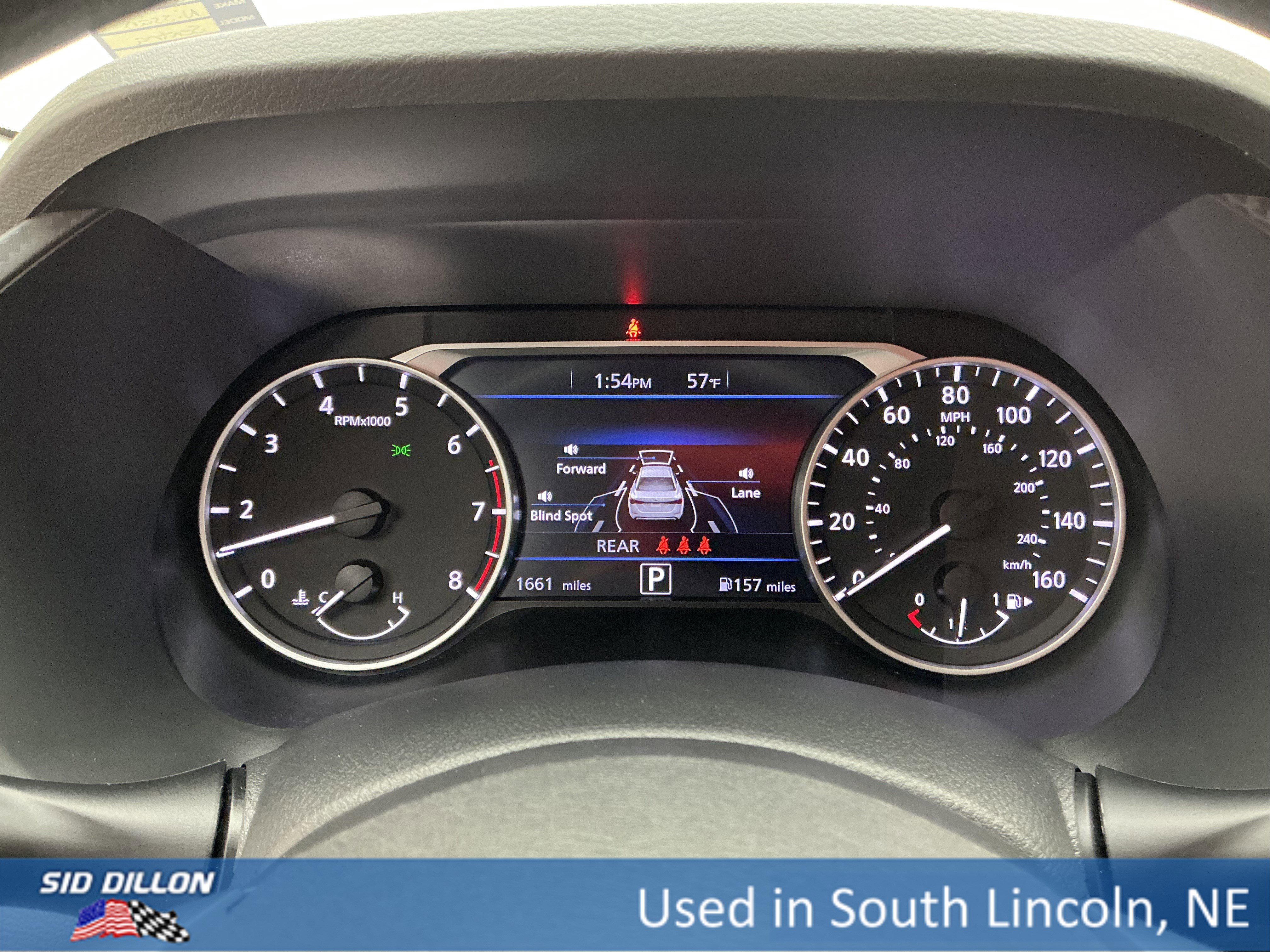 Used 2024 Gun Metallic Nissan SV image 11