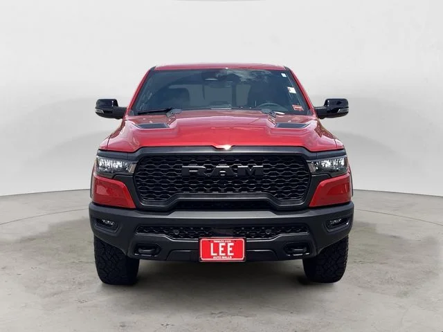 New 2026 Molten Red Ram REBEL CREW CAB 4X4 5