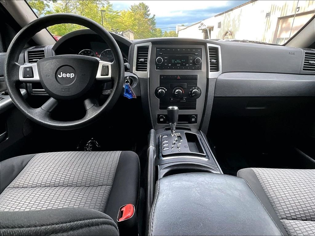 Used 2009 Modern Blue Pearlcoat Jeep Laredo image 20