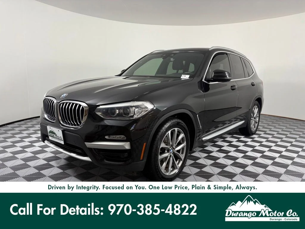 Used 2019 Black BMW xDrive30i image 1