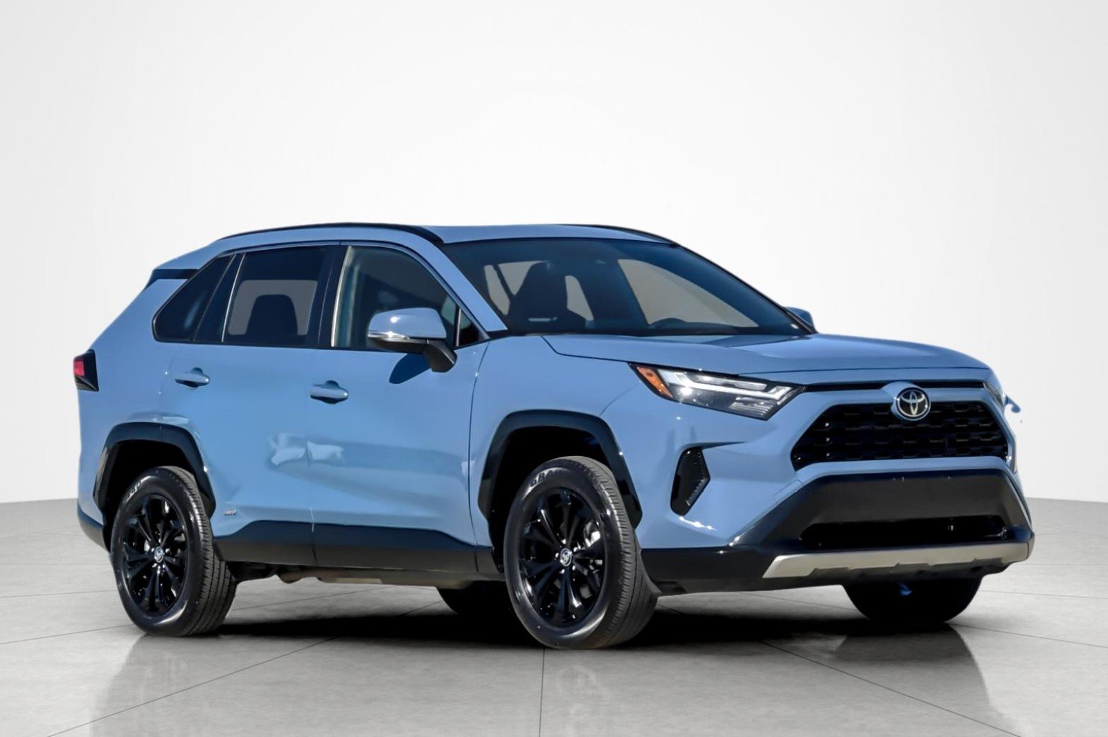 Used 2025 Cavalry Blue Toyota Hybrid SE image 7
