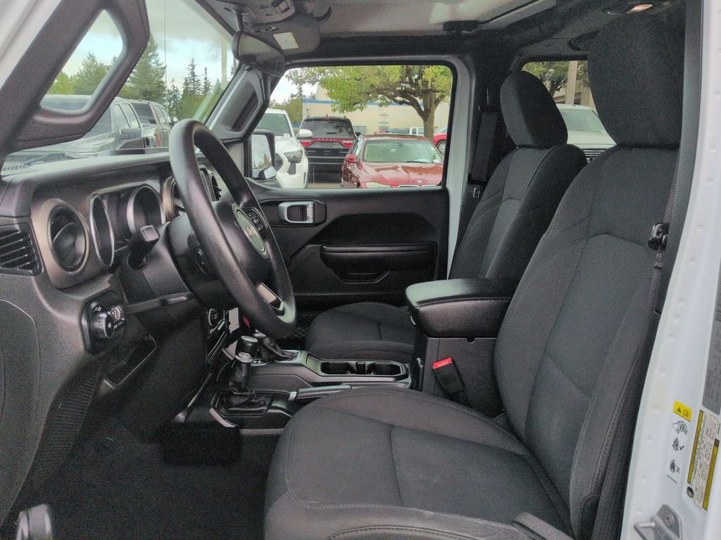 Used 2018 Bright White Clearcoat Jeep Unlimited Sport image 11