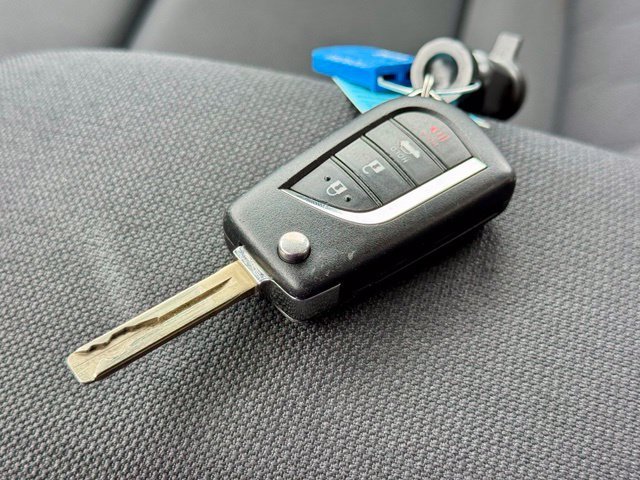 Used 2025 Midnight Black Metallic Toyota LE image 24