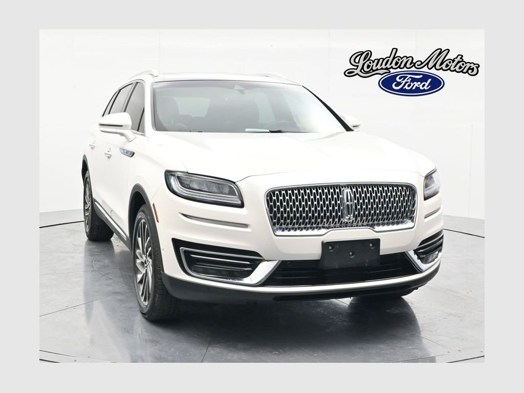 Used 2019 White Platinum Clearcoat Metallic Lincoln Reserve image 1