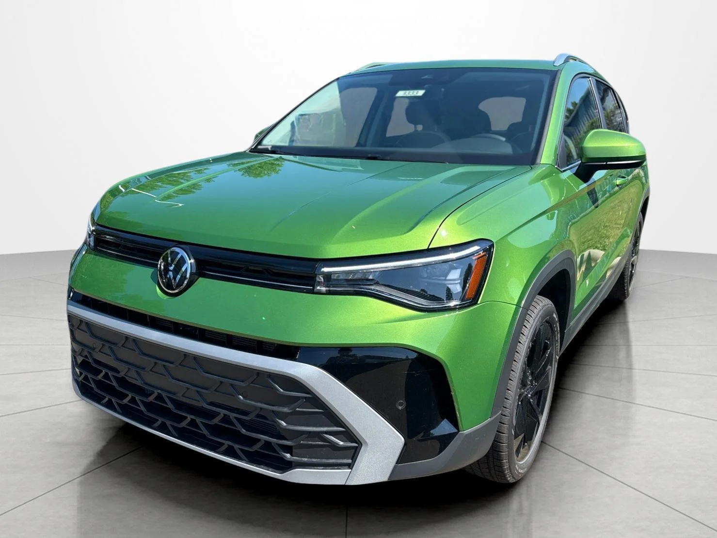 New 2026 Bright Moss Green Metallic Volkswagen SE image 1