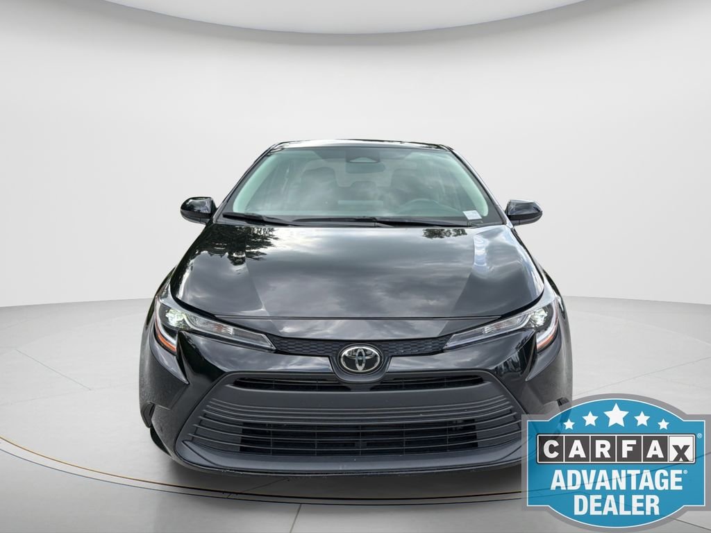 Used 2024 Black Toyota LE image 2