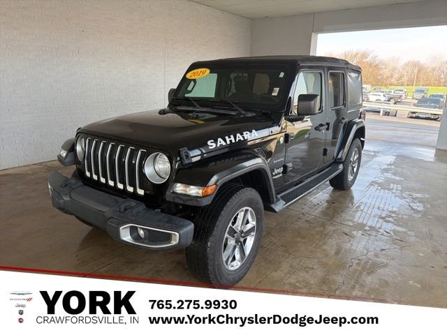 Used 2019 Black Jeep Unlimited Sahara image 1