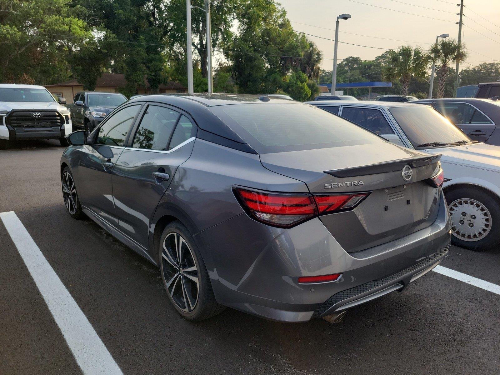 Used 2021 Gun Metallic/Super Black Nissan SR image 2