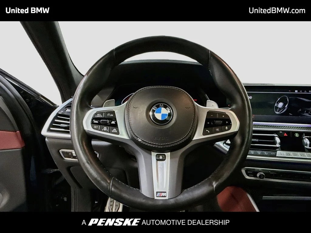 Used 2022 Black Sapphire Metallic BMW M50i image 13