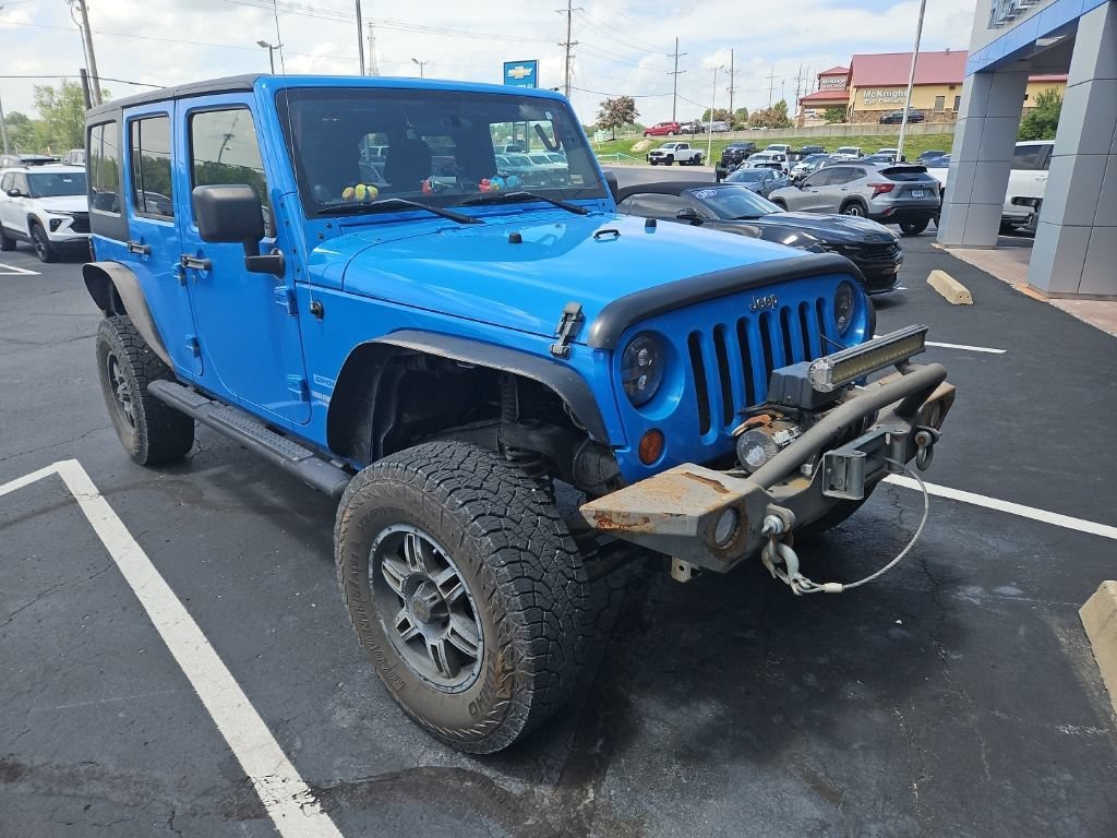 Used 2011 Jeep Wrangler Unlimited Sport with VIN 1J4BA3H13BL553158 for sale in Kansas City