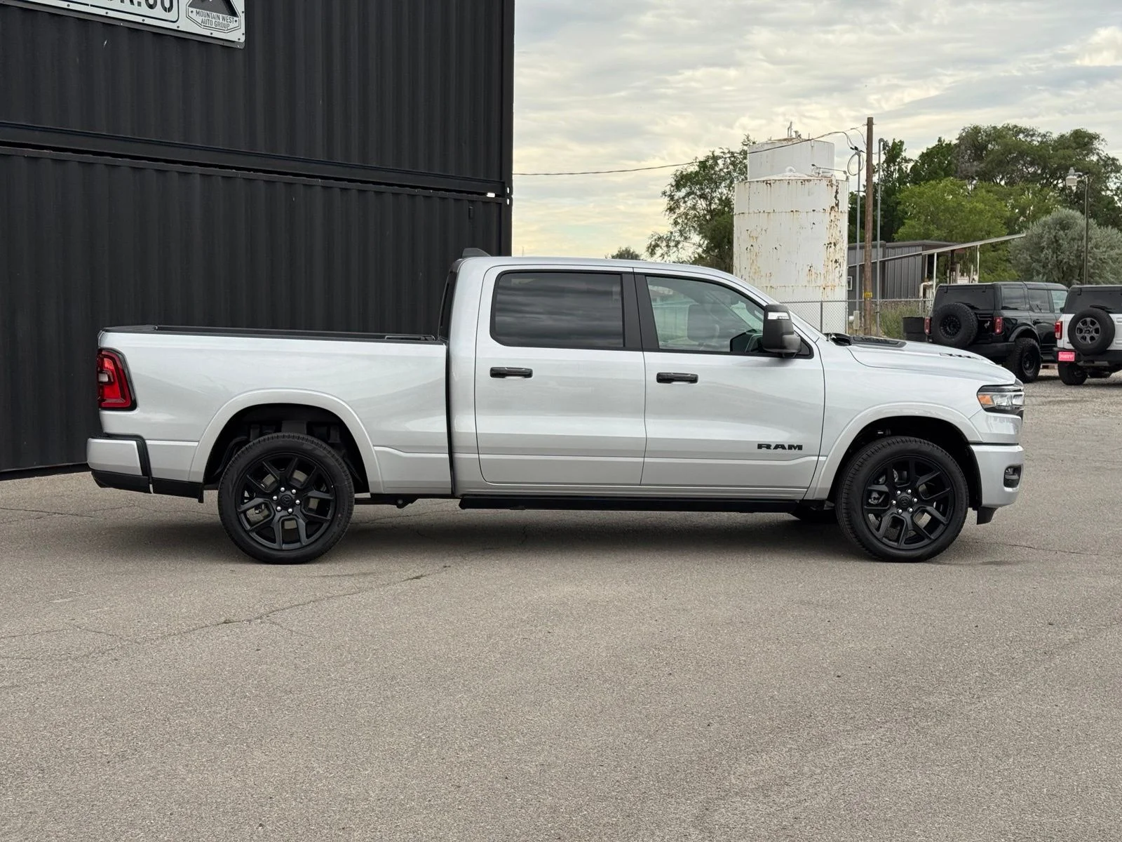 New 2026 Silver Zynith Exterior Paint RAM Laramie image 6