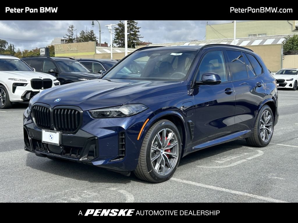 New 2026 Tanzanite Blue II Metallic BMW xDrive50e image 1