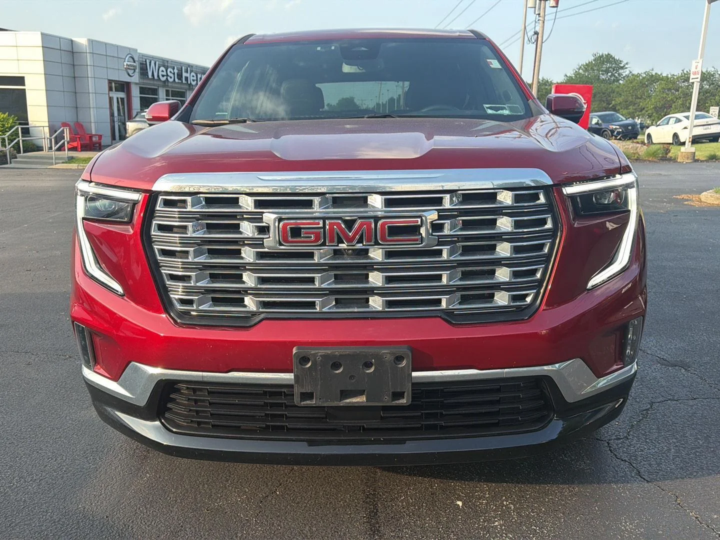 Used 2024 Volcanic Red Tintcoat GMC AWD Denali image 2