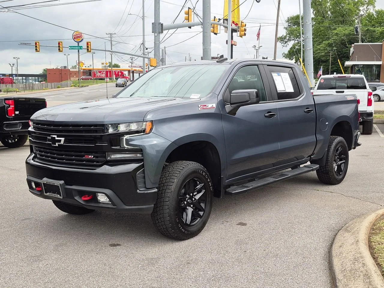 Used 2021 SHADOW GRAY METALLIC Chevrolet LT Trail Boss image 4