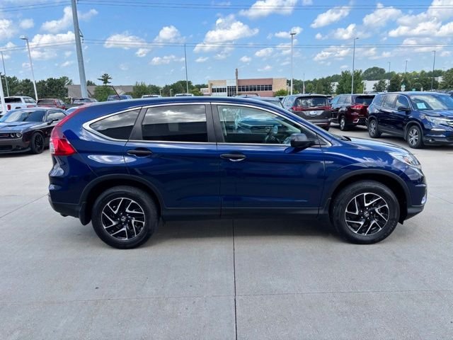 Used 2016 Obsidian Blue Pearl Honda SE image 4