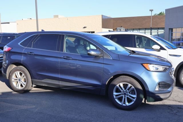 Used 2019 Blue Metallic Ford SEL image 4