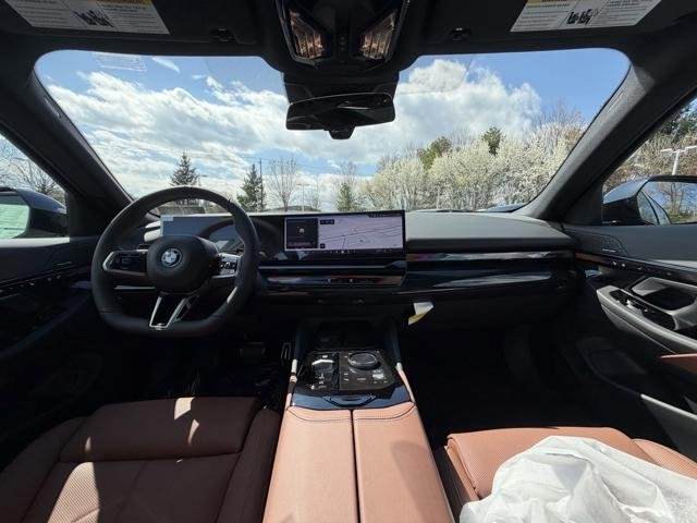 New 2026 Black Sapphire Metallic BMW 550e xDrive image 18