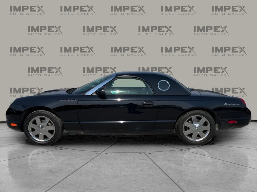 Used 2002 Black Ford Base image 2