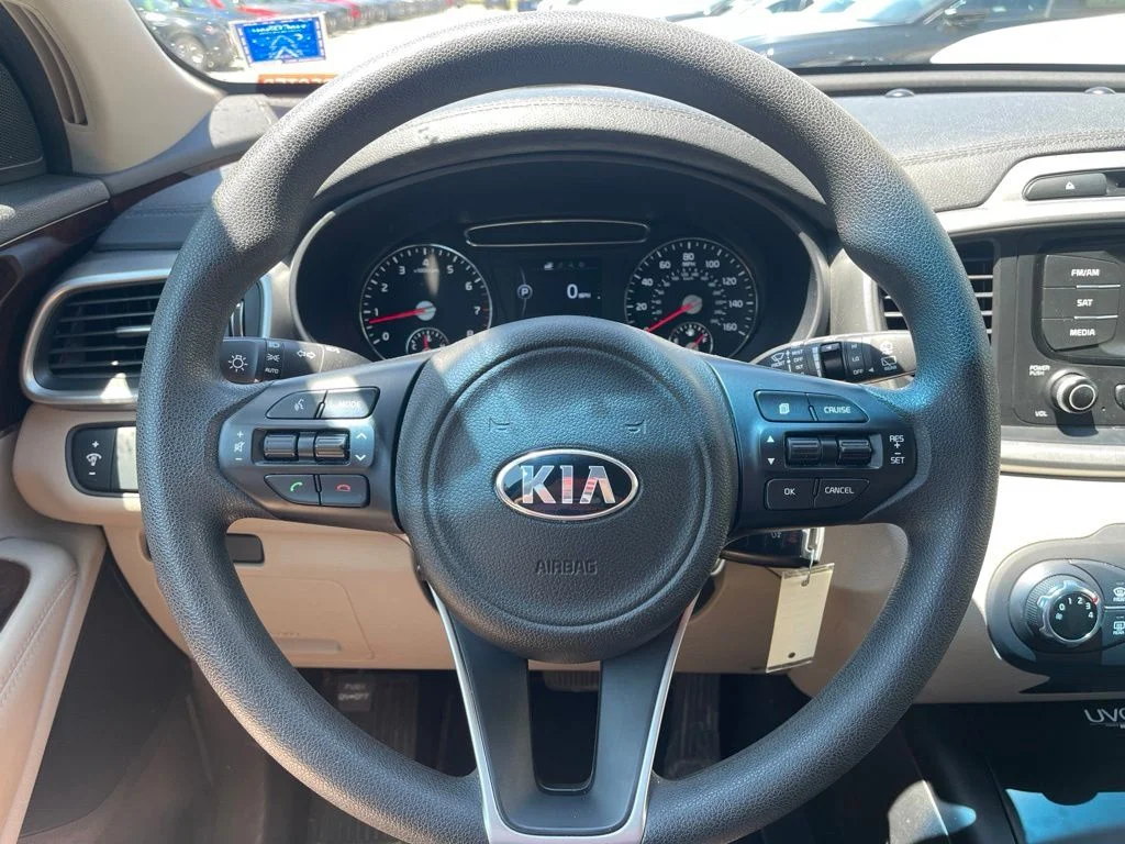 Used 2016 Dark Cherry Kia LX image 9