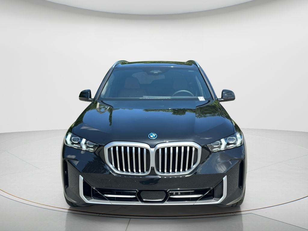 New 2026 Black Sapphire Metallic BMW xDrive50e image 2