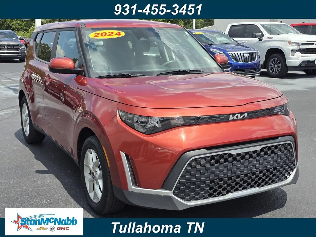 Used 2024 Orange Kia LX image 1