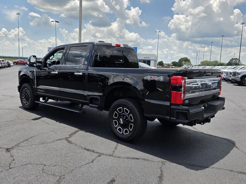 Used 2024 Black Metallic FORD PLATINUM 4WD CREW CAB 6.75