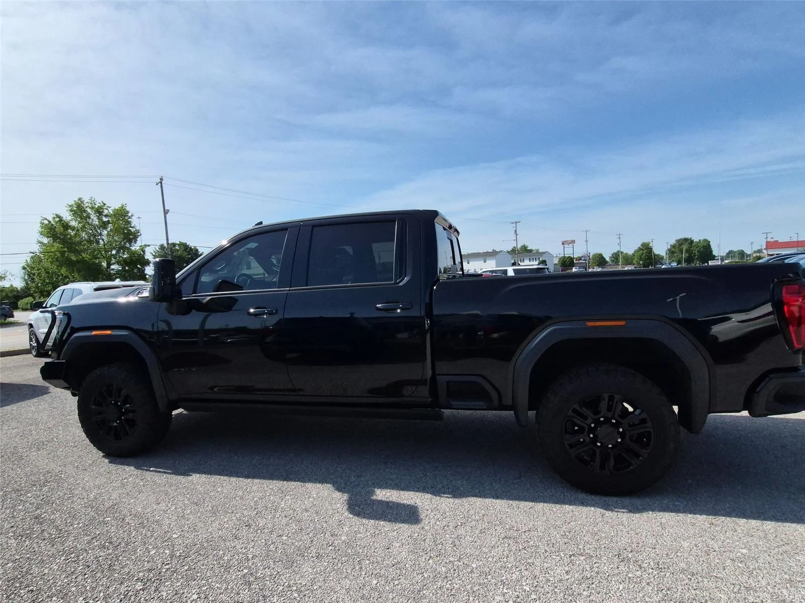 Used 2021 Ebony Twilight Metallic GMC Denali image 2