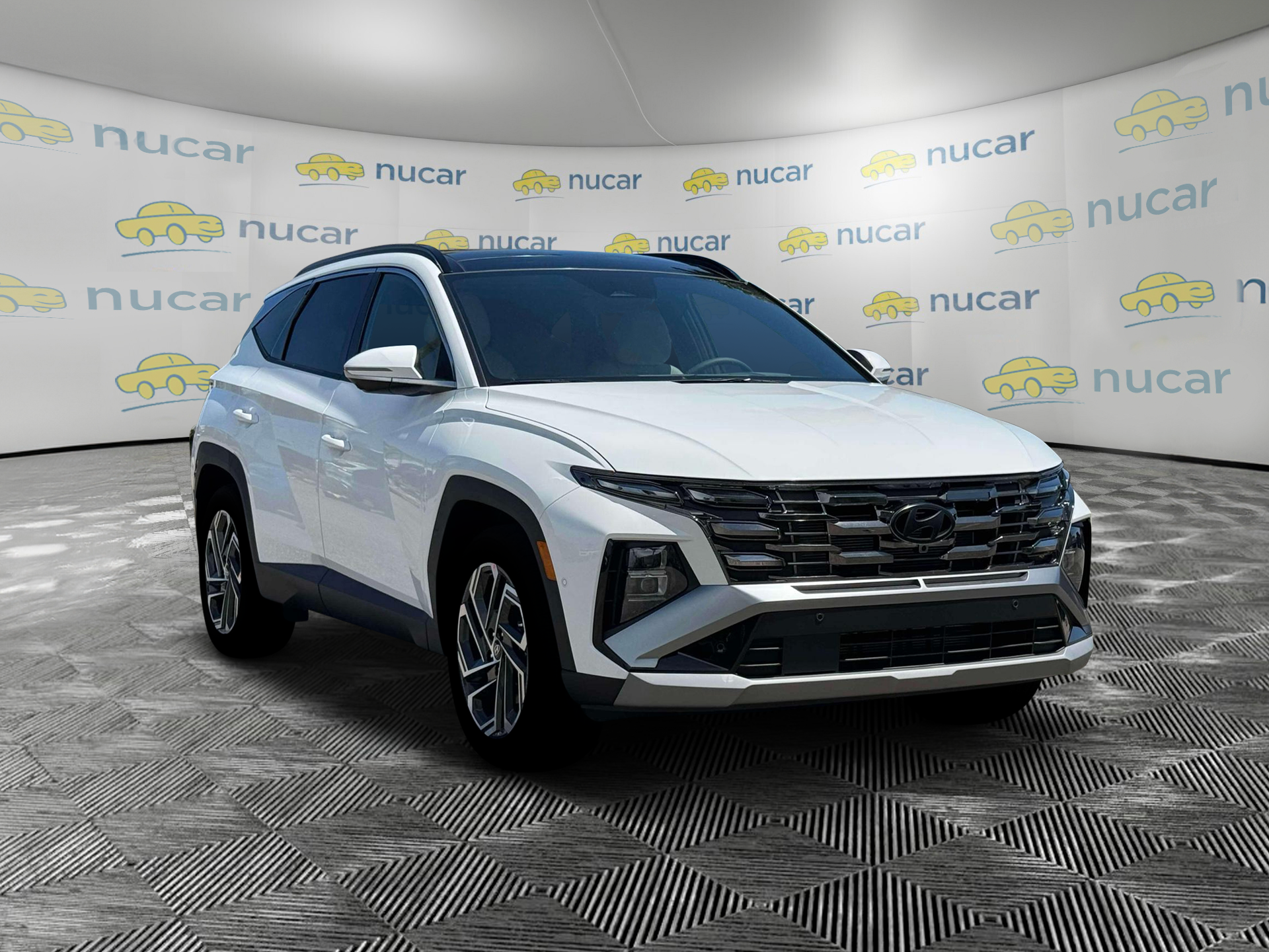 2026 Hyundai Tucson Limited in White at Nucar — photo 11
