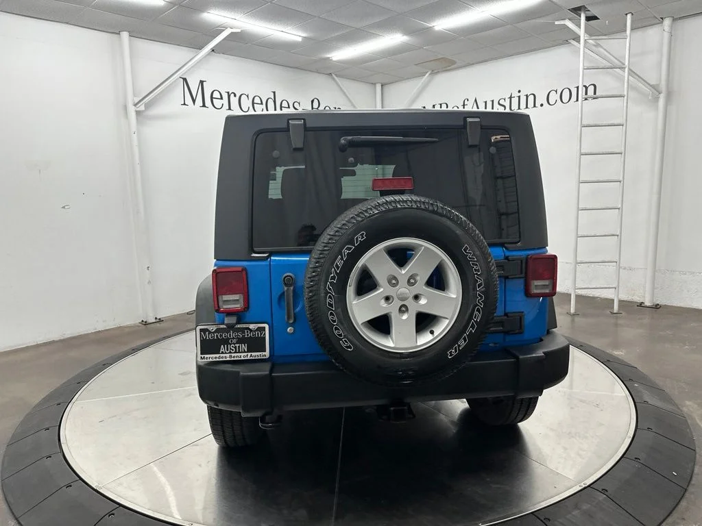Used 2011 Blue Jeep Sport image 6