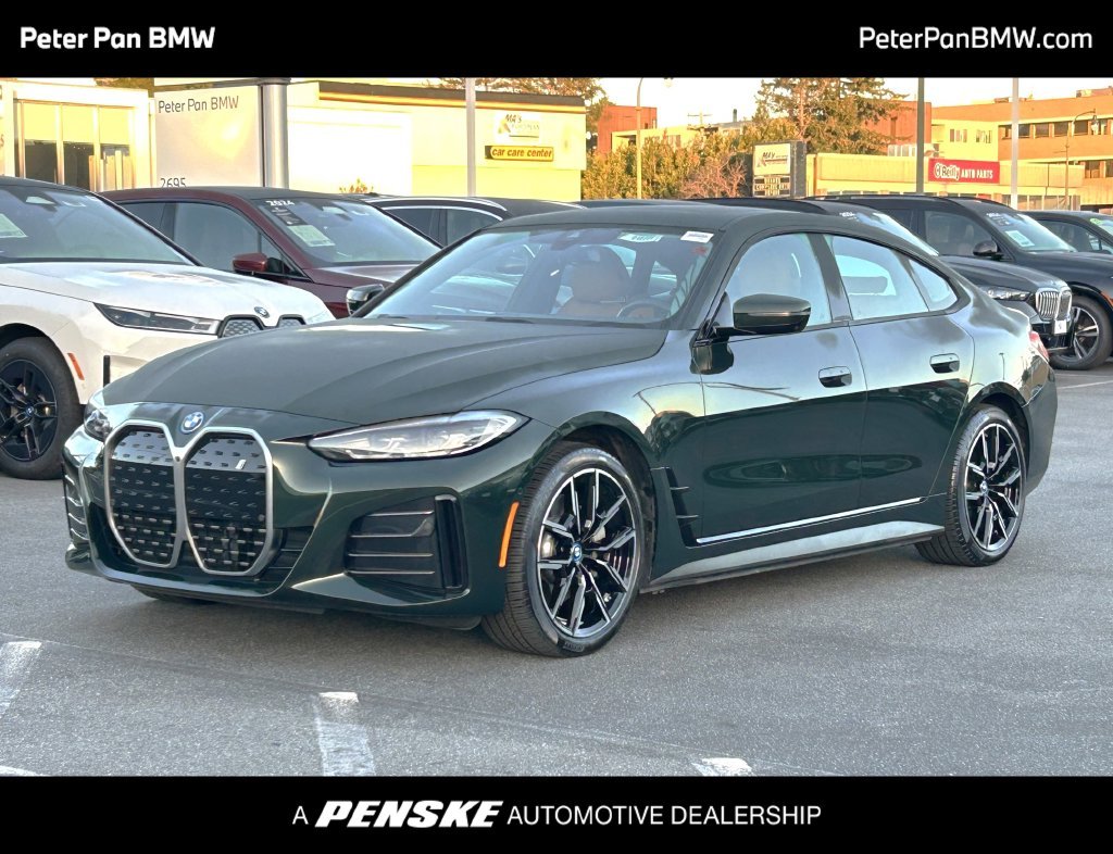 Certified Used 2024 Green Metallic BMW eDrive35 image 1