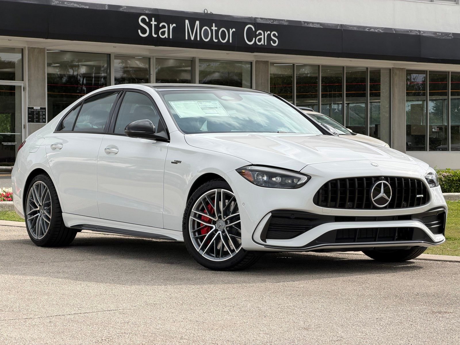 New 2026 MANUFAKTUR Moonlight White Metallic Mercedes-Benz AMG® C 43 4MATIC® Sedan image 1