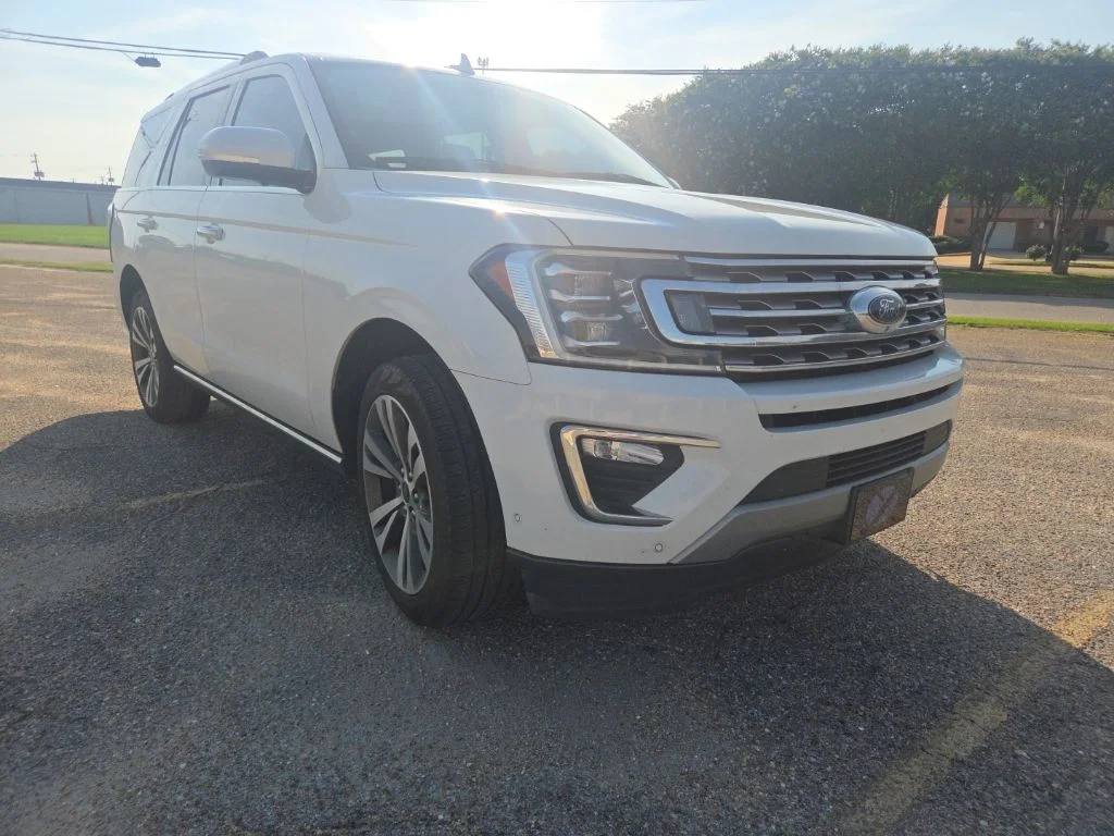 Used 2021 White Metallic Ford Limited image 1
