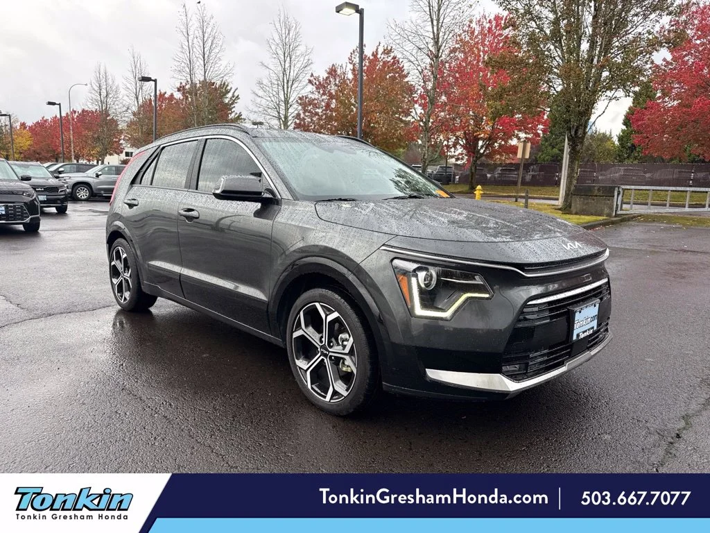 Used 2024 Graphite Gray Kia EX Touring image 1