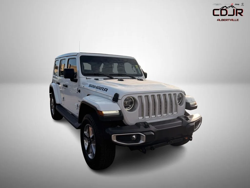 Used 2020 White Jeep Unlimited Sahara image 1