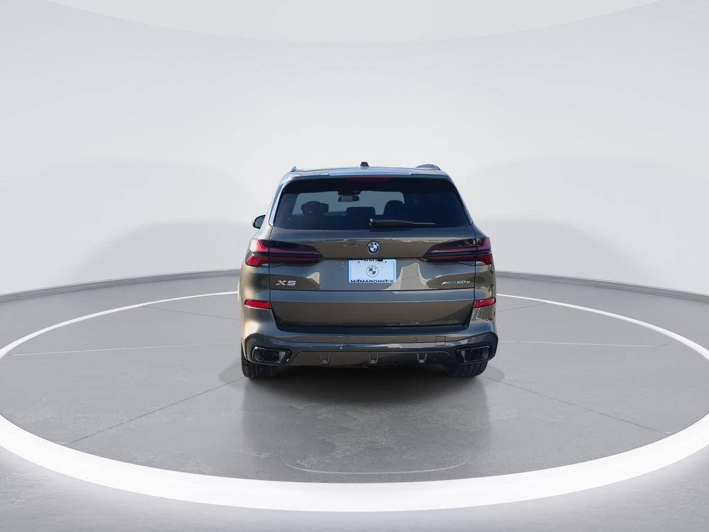 New 2026 Green Metallic BMW xDrive50e image 7