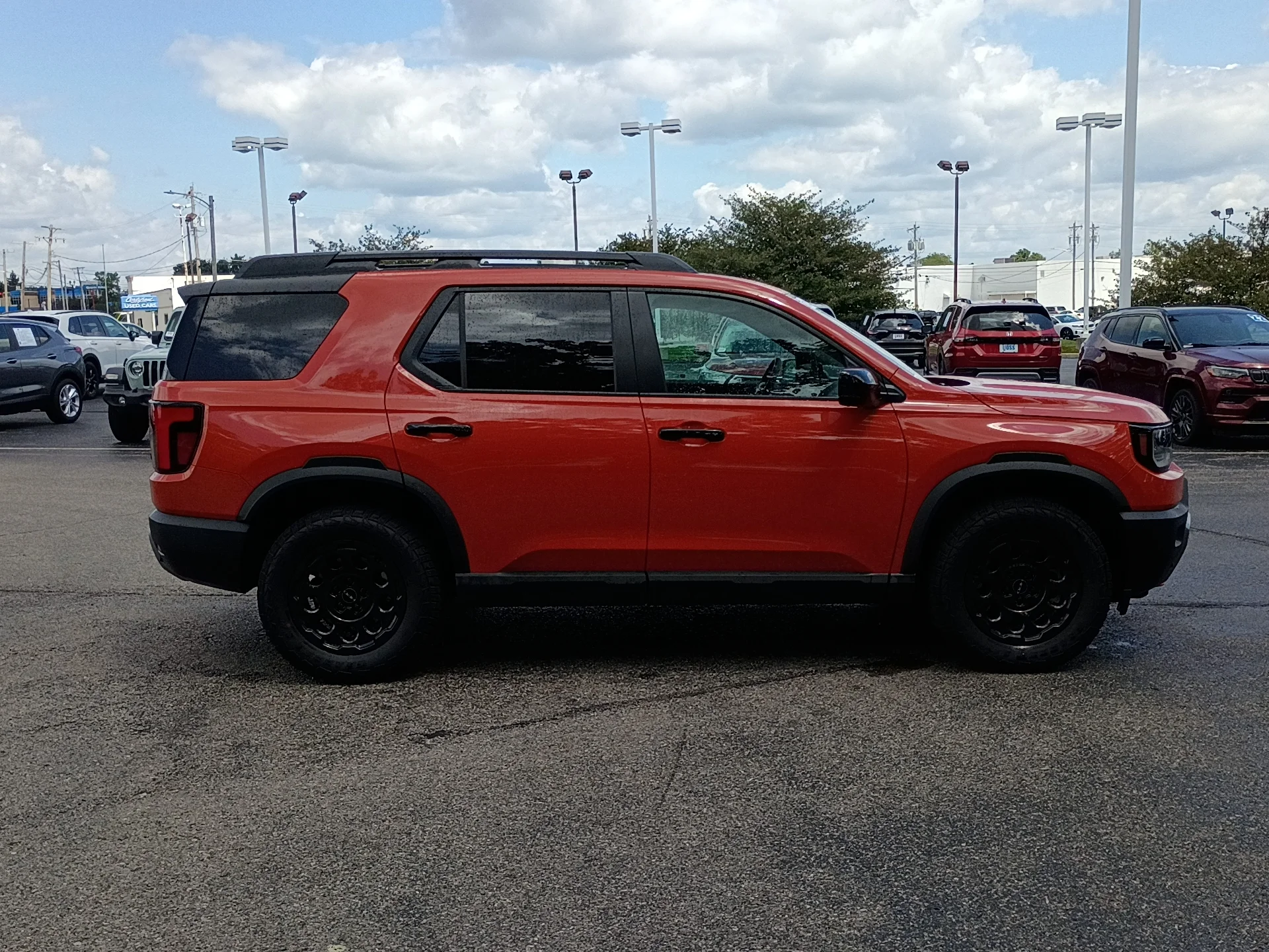 Certified Used 2026 Sunset Orange II Honda TrailSport Blackout image 2