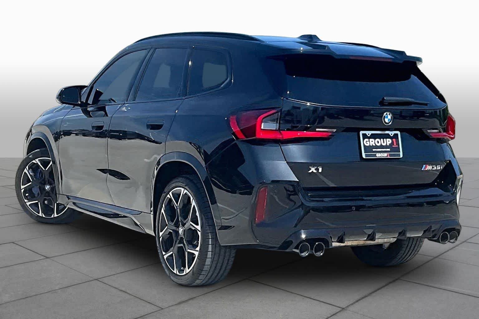 Used 2026 Black Sapphire Metallic BMW M35i image 11