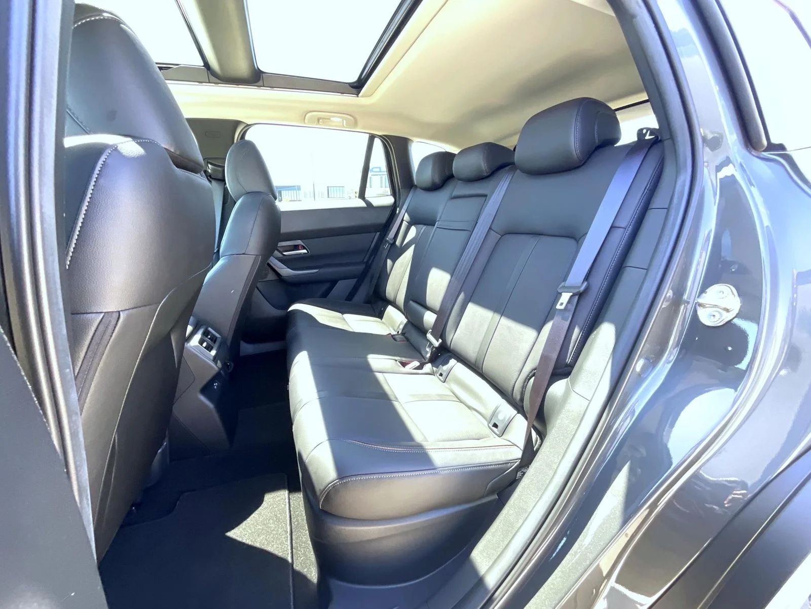 New 2026 Machine Gray Metallic Mazda Premium AWD image 19