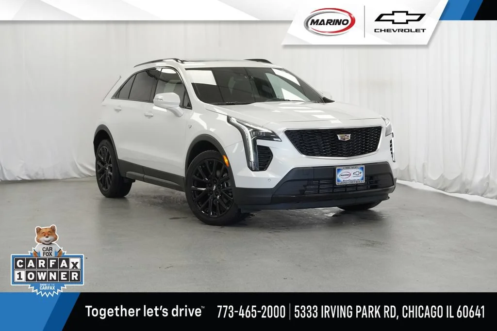 Used 2023 Crystal White Tricoat Cadillac Sport image 1