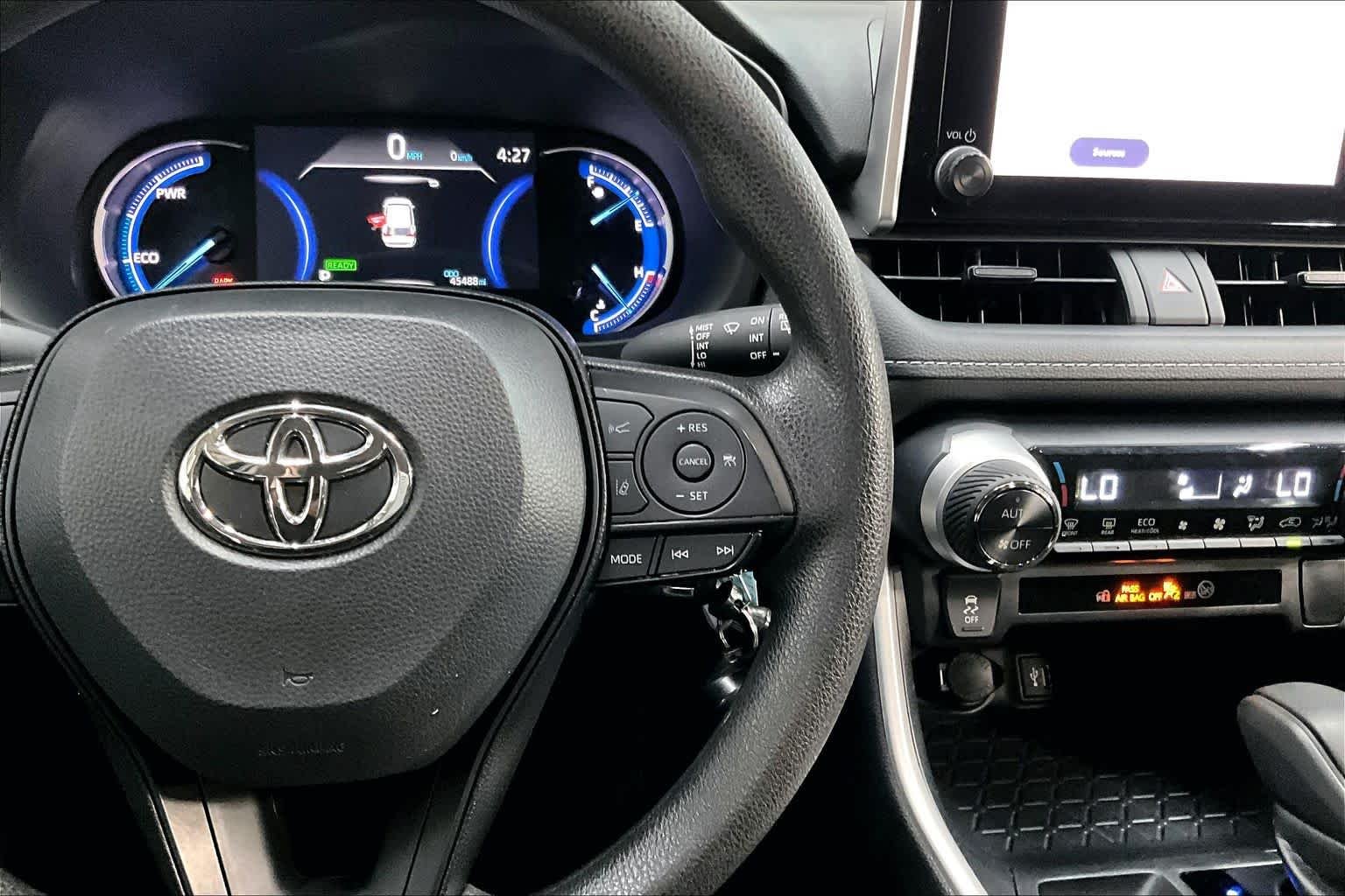 Used 2025 Midnight Black Metallic Toyota Hybrid LE image 25