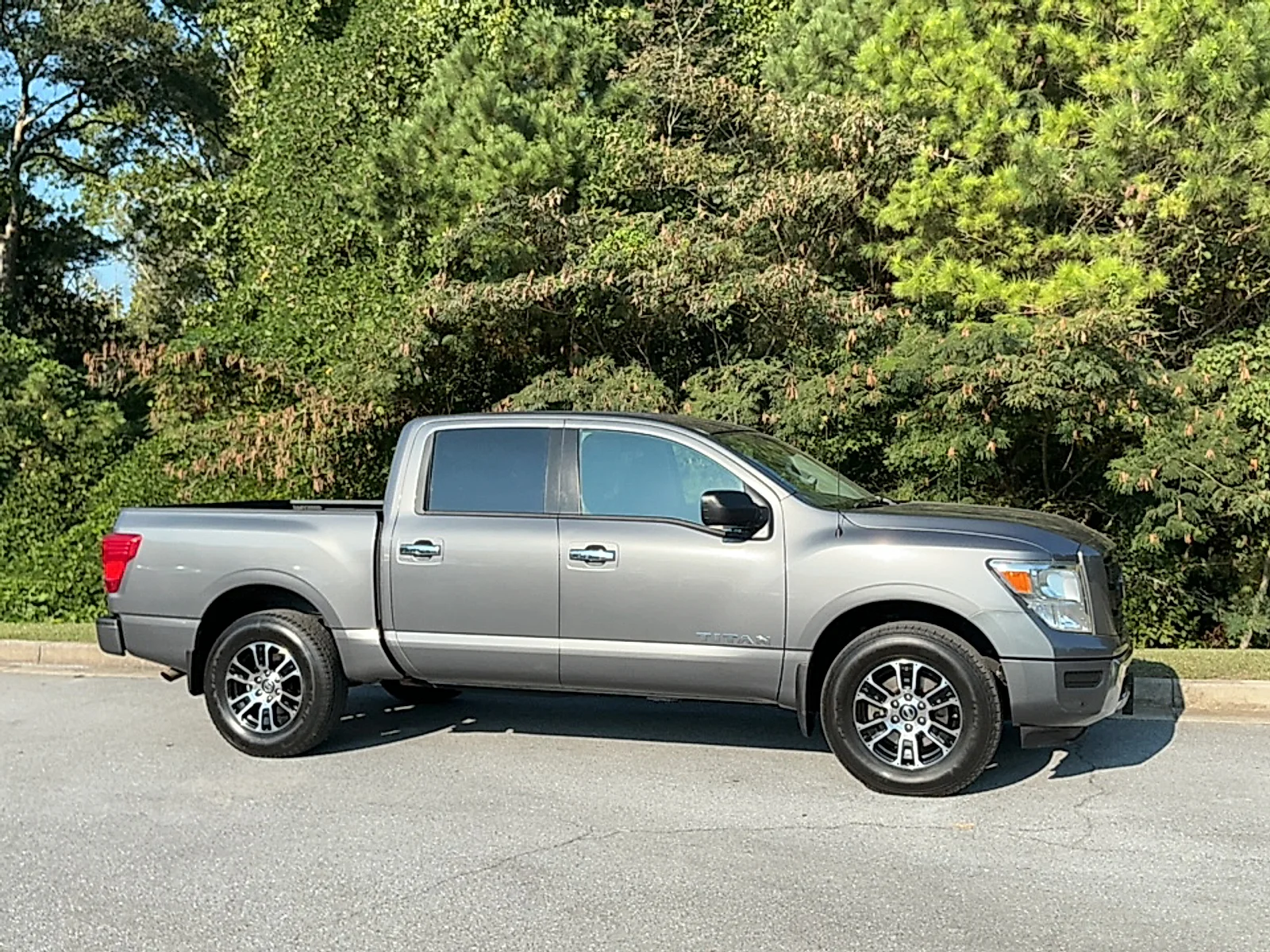 Used 2021 Gun Metallic Nissan Crew Cab SV 4x4 image 1