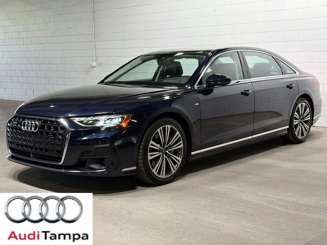 Used 2023 Blue Metallic Audi L 55 image 1
