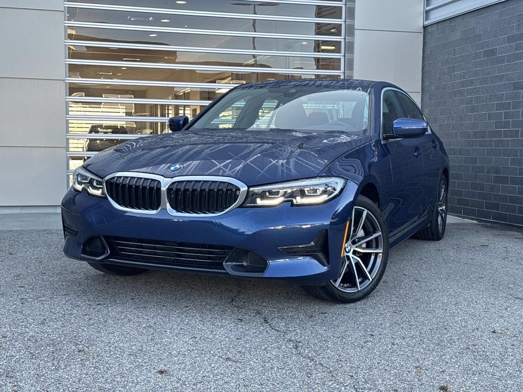 Used 2022 Blue Metallic BMW 330i xDrive image 1